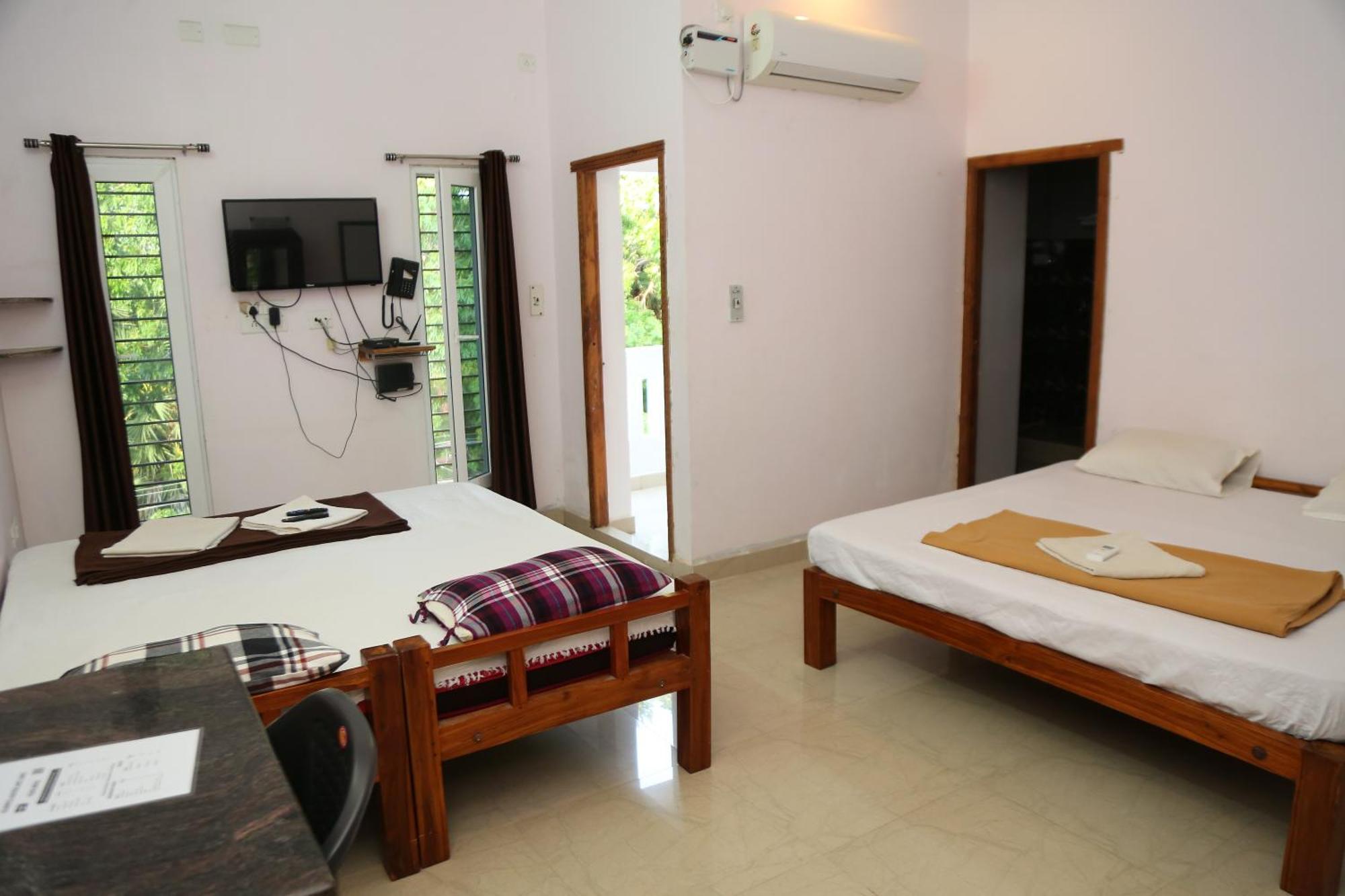 Ferienwohnung Art Le Cafe Auroville Zimmer foto